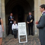 Best Man checks his cuffs. All is calm.